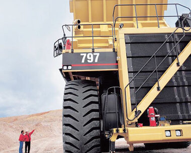 Effectenspiegel-caterpillar-bagger-in-gelb